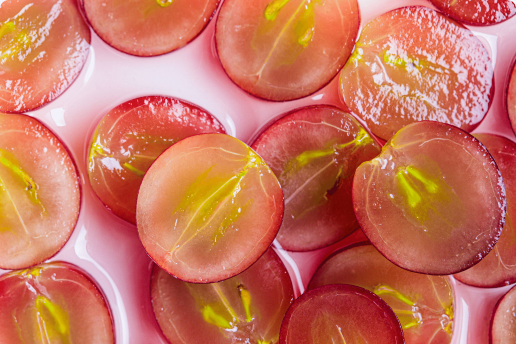 A photo with half sliced grapes for making grape seed extract